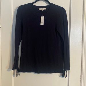 New with tags! Navy blue Loft sweater with wrist ties